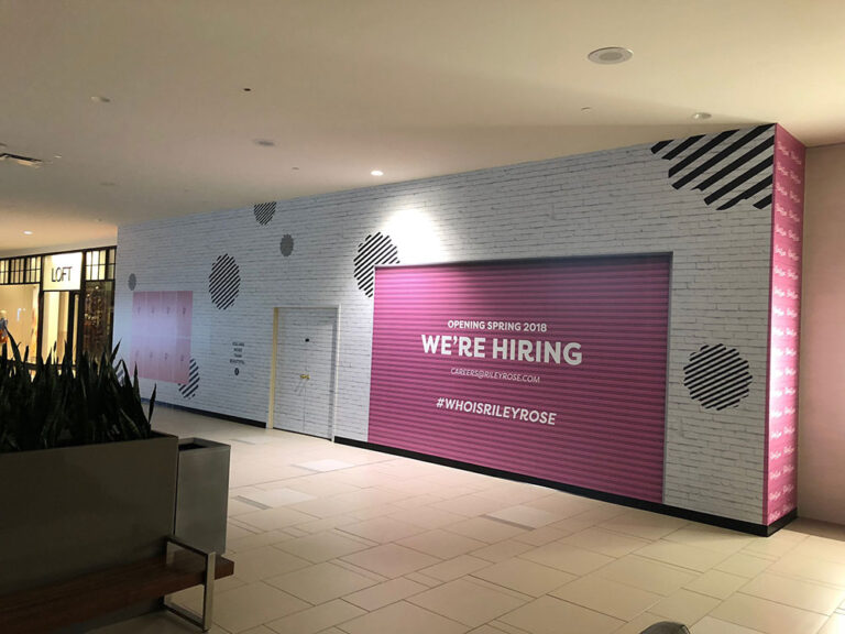 Pink, white, and black, wall graphic by Brand Command