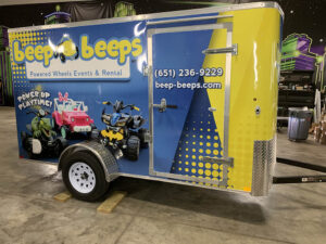 Yellow and Blue commercial trailer wrap