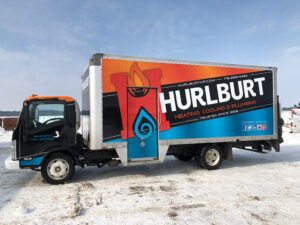 Hurlburt truck wrap orange and blue