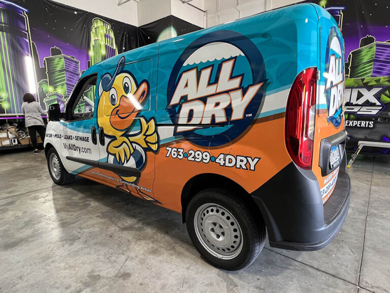 All Dry Plumbing Van wrapped in a custom design