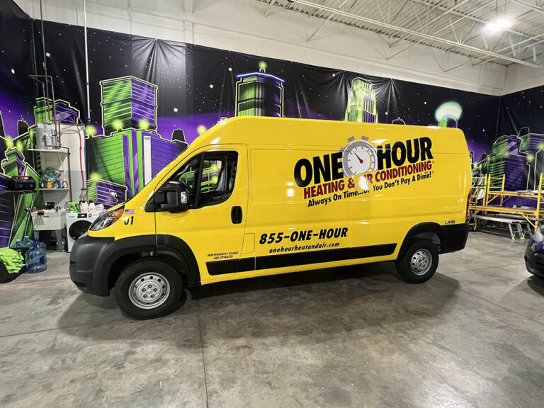 yellow and black commercial van wrap